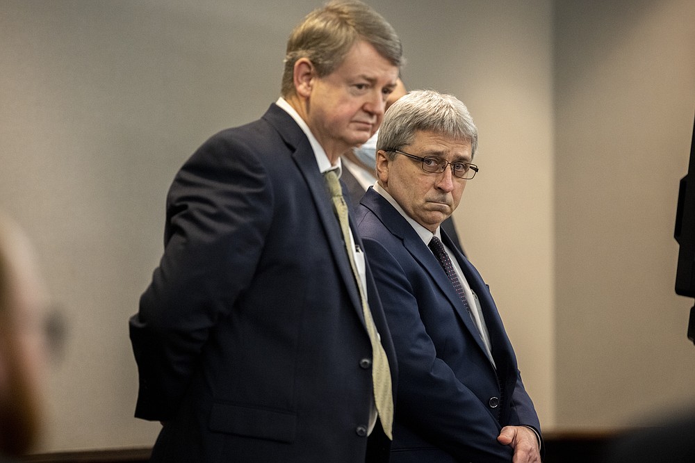 William "Roddie" Bryan stands next to his attorney Kevin Gough after the jury handed down their verdict in the Glynn County Courthouse, Wednesday, Nov. 24, 2021, in Brunswick, Ga. Greg McMichael and his son, Travis McMichael, and Bryan, charged in the death of Ahmaud Arbery were convicted of murder Wednesday in the fatal shooting that became part of a larger national reckoning on racial injustice.(AP Photo/Stephen B. Morton, Pool)