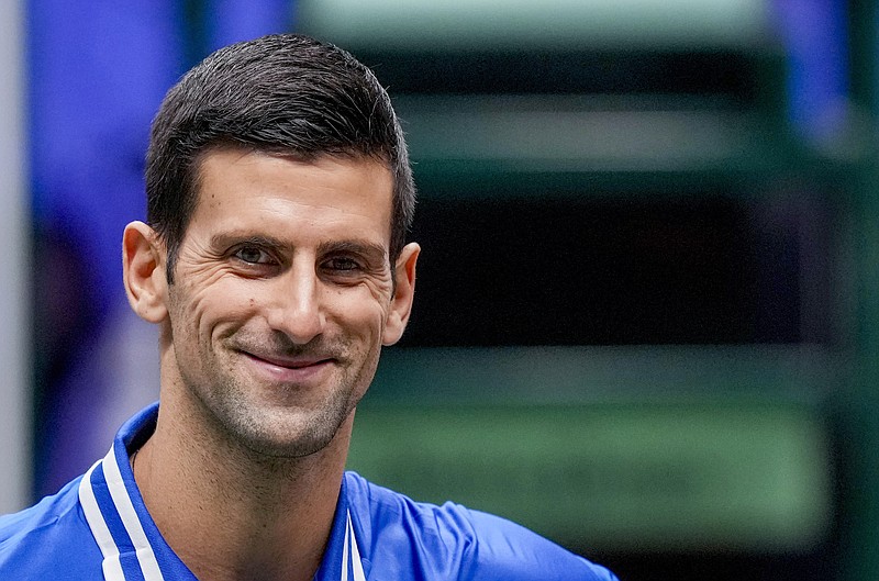 Serbia's Novak Djokovic smiles during his match against Austria's Dennis Novak in a Davis Cup group F match between Serbia and Austria in Innsbruck, Austria, Friday. - Photo by Michael Probst of The Associated Press