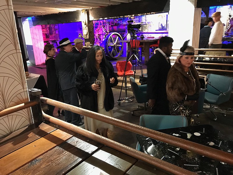 Residents dressed in 1920s apparel, collect at the 1923 Banana Club Saturday in honor of native Texarkana Ragtime King Scott Joplin's 153rd birthday. Born around Nov. 24, 1868, Joplin composed at least 100 Ragtime songs before his passing in April of 1917.(Staff Photo By Greg Bischof)