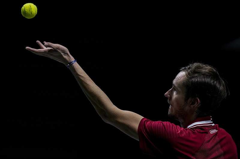 Russian Tennis Federation's Daniil Medvedev serves against Ecuador's Emilio Gomez during their Davis Cup tennis match at the Madrid Arena stadium in Madrid, Spain, Saturday, Nov. 27, 2021. (AP Photo/Bernat Armangue)