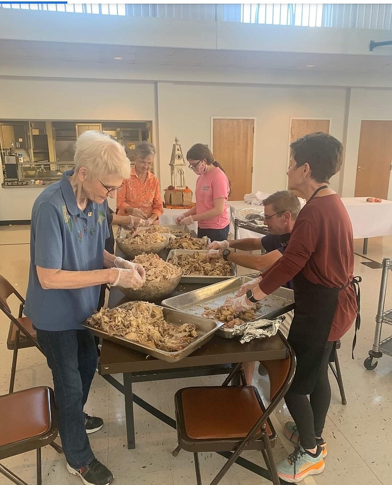 Photo courtesy of First Unite Methodist
Members of the First United Methodist Church of Camden debone 30 chickens for a community meal.