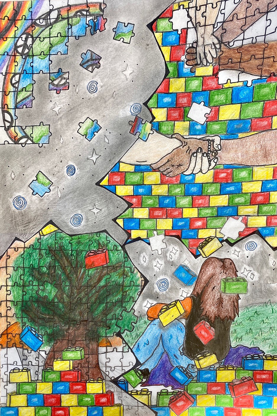 Submitted Photo
The winning poster in the local Lions Club International Peace Poster Contest features a series of scenes connected with interlocking puzzle pieces and Lego blocks. Scenes include clasping hands, a rainbow with peace signs and a young girl sitting beneath a tree and gazing up at the stars. The first place poster, created by Reese Long, has been sent on to district competition.