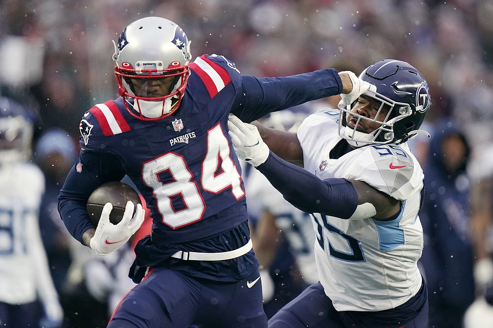 New England Patriots wide receiver Kendrick Bourne (84) breaks free from Tennessee Titans inside linebacker Jayon Brown (55) during the second half of an NFL football game, Sunday, Nov. 28, 2021, in Foxborough, Mass. (AP Photo/Steven Senne)