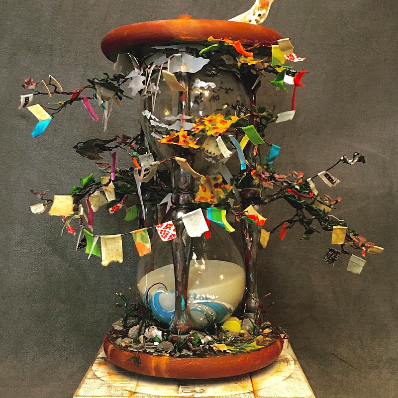 "SAY THEIR NAME", by Bill Myers is shown. The mixed media sculpture was created with found hour glass, wood, wire, handmade paper and bone. (Contributed)