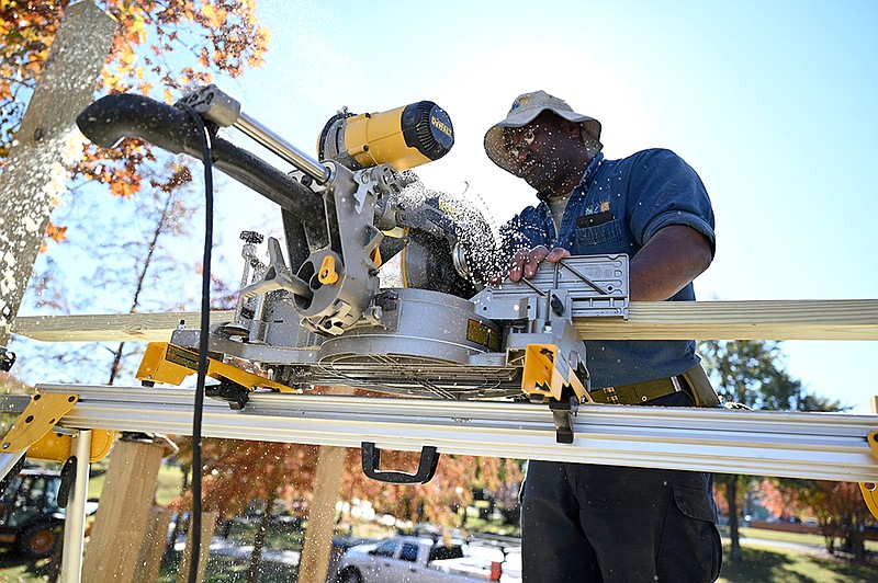 Jesse Lawson works on a tree house being built on the bank of the Arkansas River in Riverfront Park on Tuesday, Nov. 23, 2021.

(Arkansas Democrat-Gazette/Stephen Swofford)