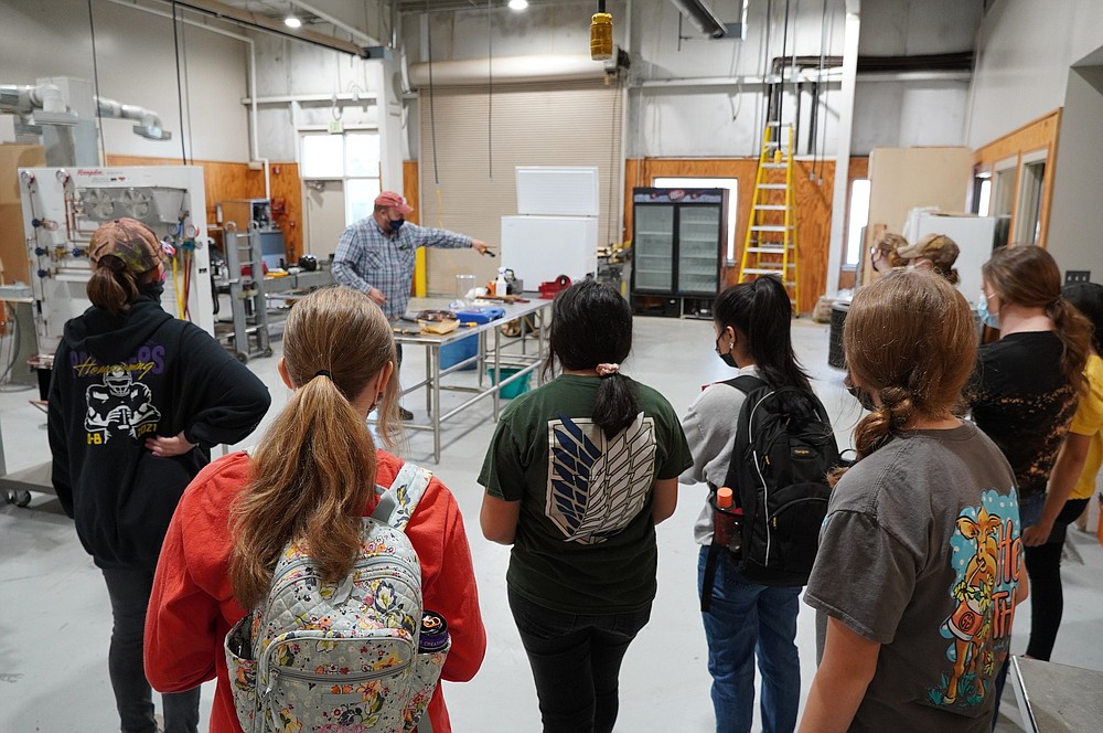 Students observe an HVAC class during the “Be A Model, Break The Mold” career exploration event. (Photo courtesy of Casey Curtis/UAHT)