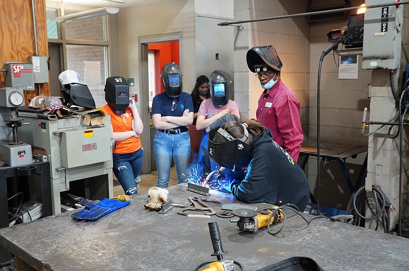 Students observe a welding class during the “Be A Model, Break The Mold” career exploration event. (Photo courtesy of Casey Curtis/UAHT)