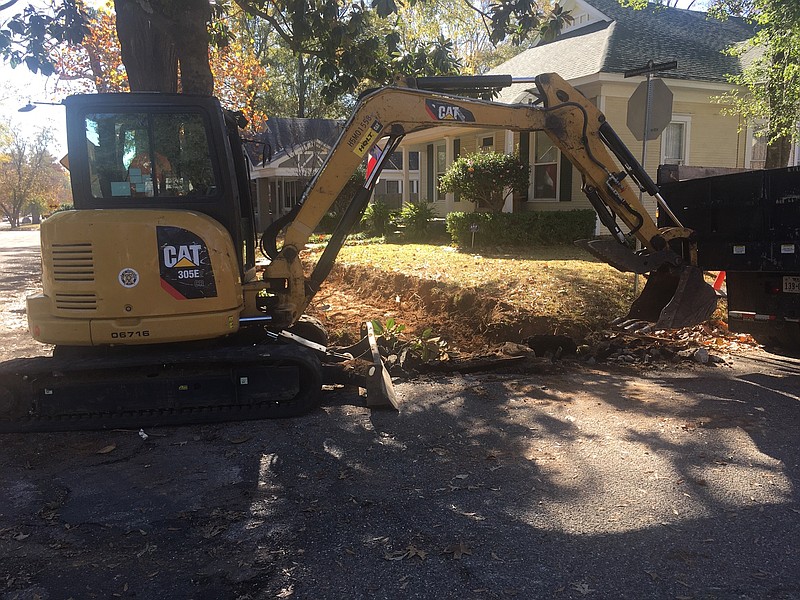 With apologies to Shel Silverstein. (He wrote and illustrated a book with a similar title in 1974.) City workers break ground on a new sidewalk project at 26th and Wood streets in Texarkana, Texas. Last week they worked on the same stretch of sidewalk at the other end of the block, the corner of 25th and Wood. For the last several years the city has been replacing and repairing sidewalks in the Highland Park Historic District and other parts of town. (Staff photo by Les Minor)