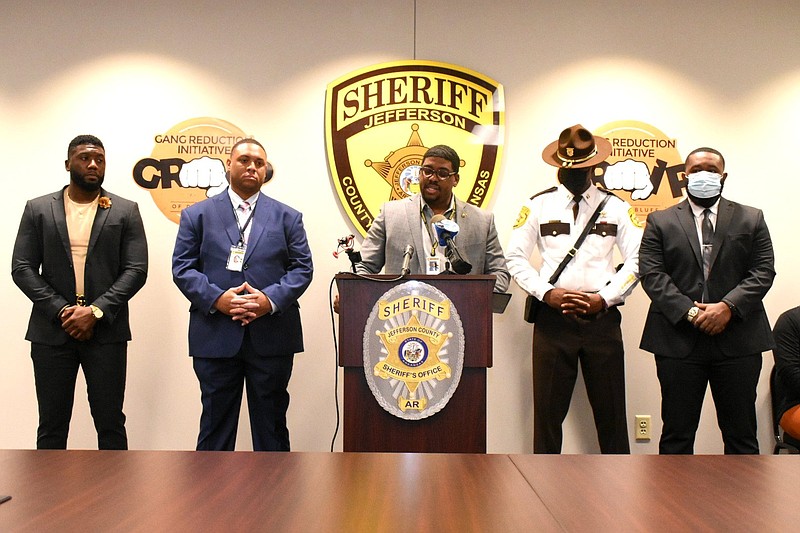 From left, Jefferson County Sheriff's Investigator Joseph O'Neal, Sgt. Courtney Kelly, Sheriff Lafayette Woods Jr., Captain Yohance Brunson and Investigator Nathan Jynes participate in a news conference introducing the Gang Reduction Initiative of Pine Bluff at the Sheriff's headquarters Tuesday, Nov. 30, 2021. (Pine Bluff Commercial/I.C. Murrell)