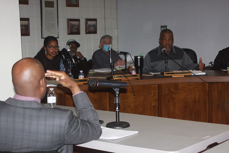 Pine Bluff Public Works Committee Chairman Ivan Whitfield and committee member Joni Alexander listen to Parks and Recreation Director Samuel Glover explain his budget. (Pine Bluff Commercial/Eplunus Colvin)