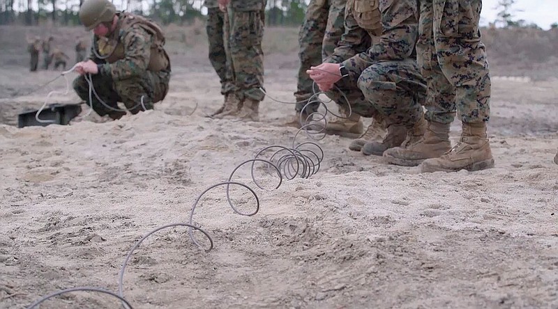 Marines train with plastic explosives at Marine Corps Engineer School at Camp Lejeune in Jacksonville, North Carolina. (U.S. Marine Corps via AP)