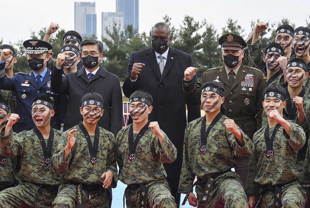 U.S. Secretary of Defense Lloyd J. Austin III, center, and South Korean Defense Minister Suh Wook, second left, pose with South Korean 2nd army command soldiers during a ceremony of the SCM (Security Consultative Meeting) at the great parade ground in the Ministry of National Defense in Seoul, South Korea, Thursday, Dec. 2, 2021. U.S. Defense Secretary Lloyd Austin said Thursday that China&amp;#x2019;s pursuit of hypersonic weapons &amp;#x201c;increases tensions in the region&amp;#x201d; and vowed the U.S. would maintain its capability to deter potential threats posed by China. (Jeon Heon-ky/Pool Photo via AP)