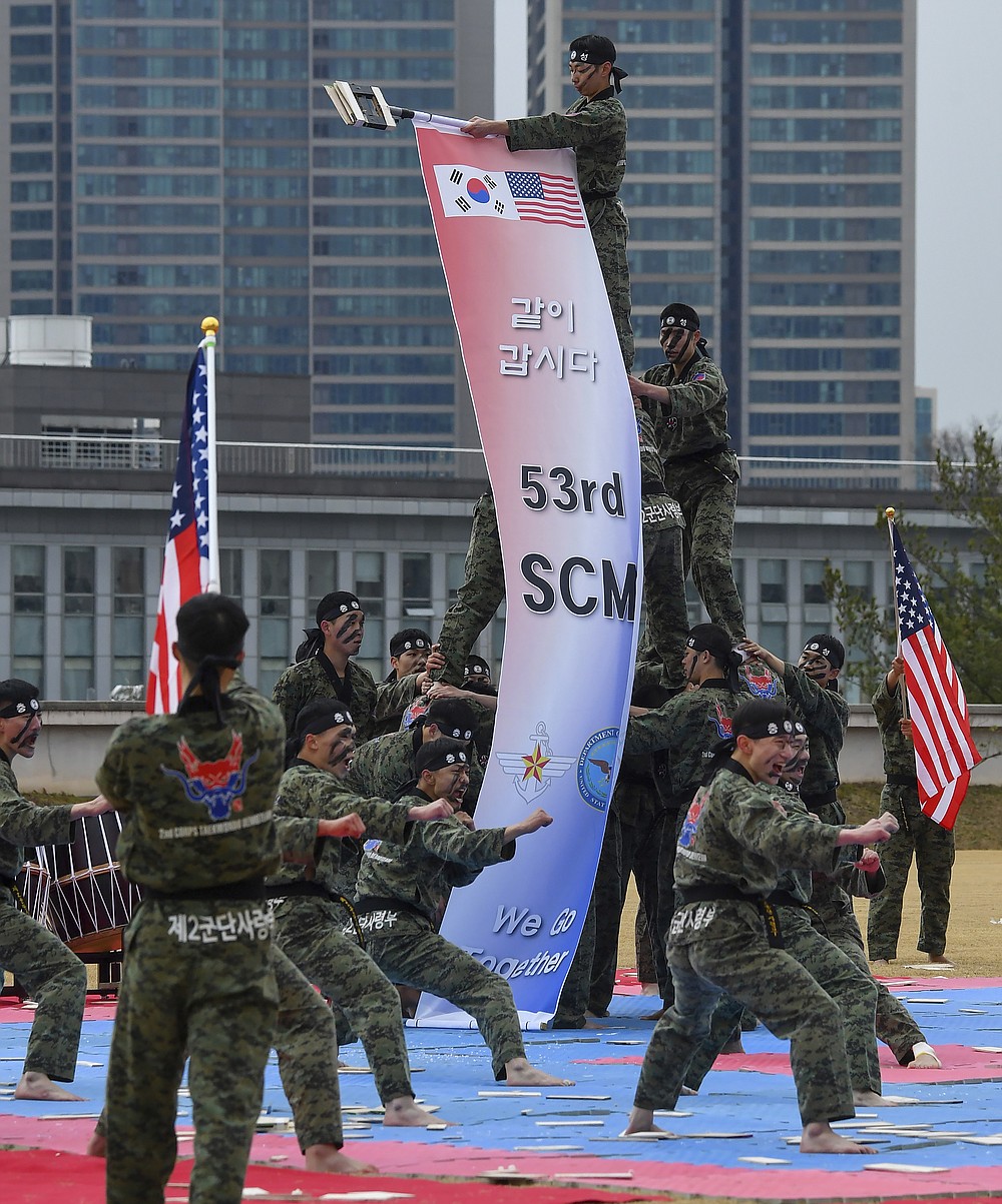 South Korean 2nd army command's soldiers perform taekwondo as U.S. Secretary of Defense Lloyd J. Austin III and South Korean Defense Minister Suh Wook (both not pictured) watch during a ceremony of the SCM (Security Consultative Meeting) at the great parade ground in the Ministry of National Defense in Seoul, South Korea, Thursday, Dec. 2, 2021. U.S. Defense Secretary Lloyd Austin said Thursday that China’s pursuit of hypersonic weapons “increases tensions in the region” and vowed the U.S. would maintain its capability to deter potential threats posed by China. (Song Kyung-seok/Pool Photo via AP)