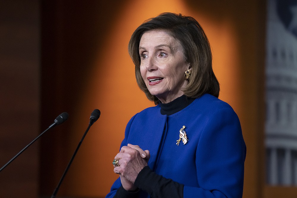 Speaker of the House Nancy Pelosi, D-Calif., updates reporters on the must-pass priority of funding the government, during a news conference at the Capitol in Washington, Thursday, Dec. 2, 2021. (AP Photo/J. Scott Applewhite)