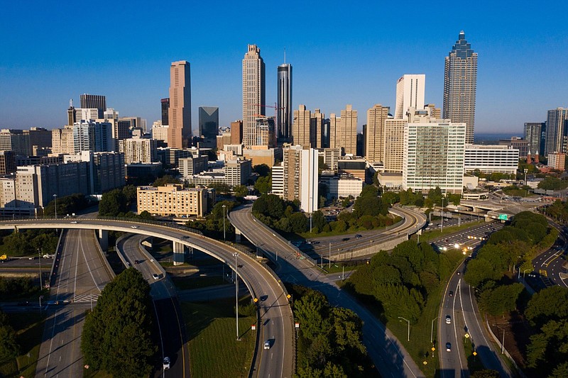 Vehicles travel along a highway in downtown Atlanta on Oct. 2, 2020. MUST CREDIT: Bloomberg photo by Dustin Chambers