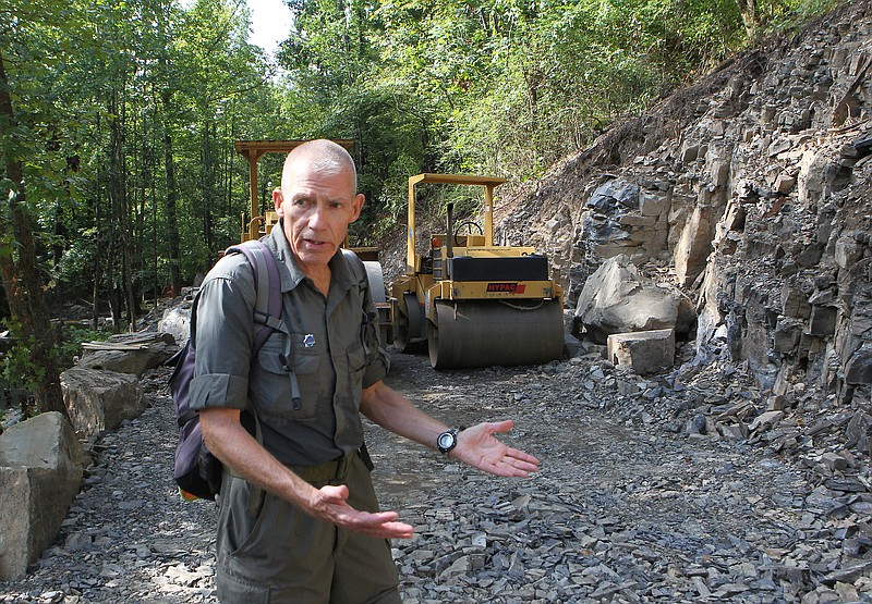 Ken Freeman discusses the Hot Springs Creek Greenway Trail construction in August 2017. - File photo by The Sentinel-Record