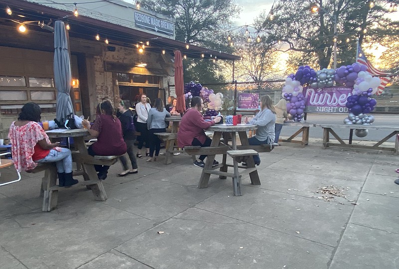 Nurses enjoy themselves at the Nurses’ Night Out event on Thursday evening at Redbone Magic Brewing. (Staff Photo by Andrew Bell)
