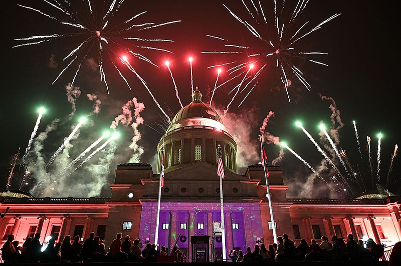 People watch the fireworks display over the Arkansas State Capitol during the Lighting Ceremony on Saturday, Dec. 4, 2021. See more photos at arkansasonline.com/1205lights/

(Arkansas Democrat-Gazette/Stephen Swofford)
