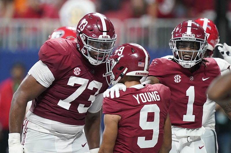 Alabama quarterback Bryce Young (9) celebrates his touchdown against Georgia during the first half of the Southeastern Conference championship NCAA football game Saturday in Atlanta. - Photo by Brynn Anderson of The Associated Press