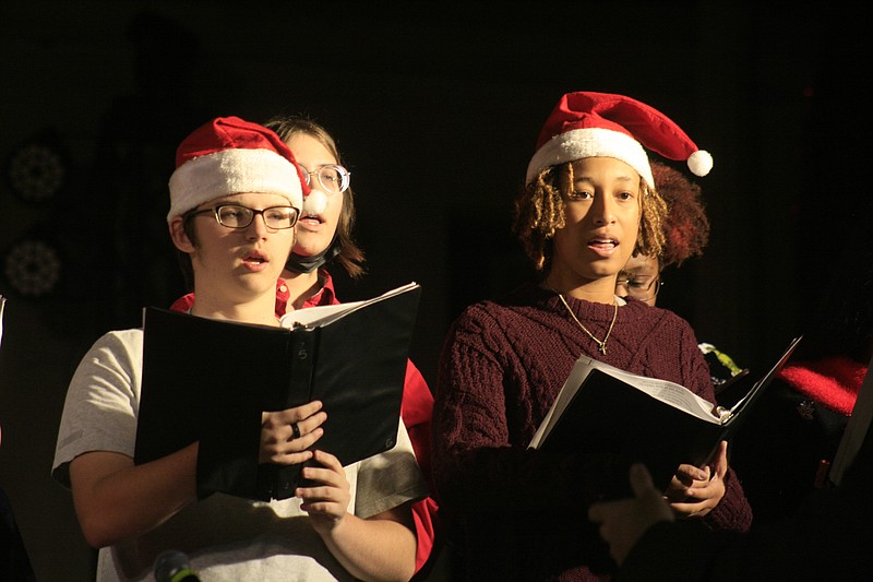 The El Dorado High School Choir performs during the annual Downtown Holiday Lighting Ceremony in this News-Times file photo.