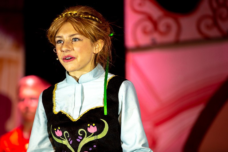 Ethan Weston/News Tribune Stella Phillips, as Anna, sings &#x201c;For the First Time in Forever&#x201d; during a dress rehearsal of &#x201c;Frozen Jr.&#x201d; on Tuesday, Nov. 30, 2021 at St. Joseph Cathedral School in Jefferson City, Mo.