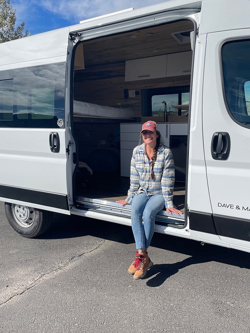 Jama Walter poses with her new van in Gypsum, Colo., on Oct. 11 after she picked it up and drove it for the first time. She also bought a condo to give her a home base when she’s not on the road.

(Courtesy Photo/Jama Walter)