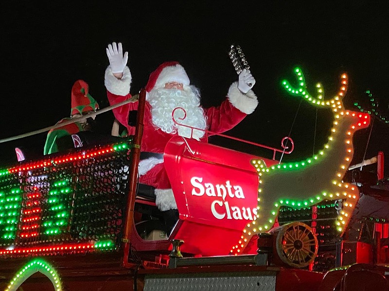 Santa arrived by the Santa Truck. This year marked the Santa Truck's 20th anniversary and its co-founder John Badgley served as the evening?s Santa. (Special to The Commercial)