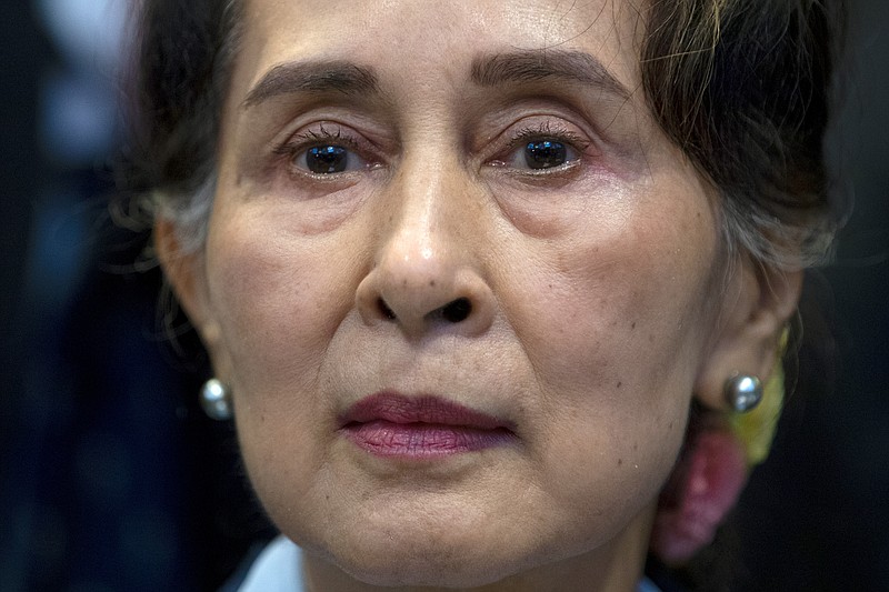 FILE - Myanmar's leader Aung San Suu Kyi waits to address judges of the International Court of Justice on the second day of three days of hearings in The Hague, Netherlands on Dec. 11, 2019. Myanmar court on Monday, Dec. 6, 2021, sentenced ousted leader Suu Kyi to 4 years for incitement and breaking virus restrictions, then later in the day state TV announced that the country's military leader reduced the  sentence by two years. (AP Photo/Peter Dejong, File)