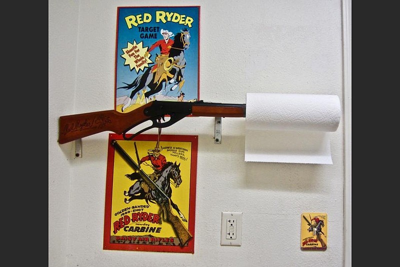 An air rifle holds toilet paper at Daisy Airgun Museum in Rogers. (Special to the Democrat-Gazette/Marcia Schnedler)