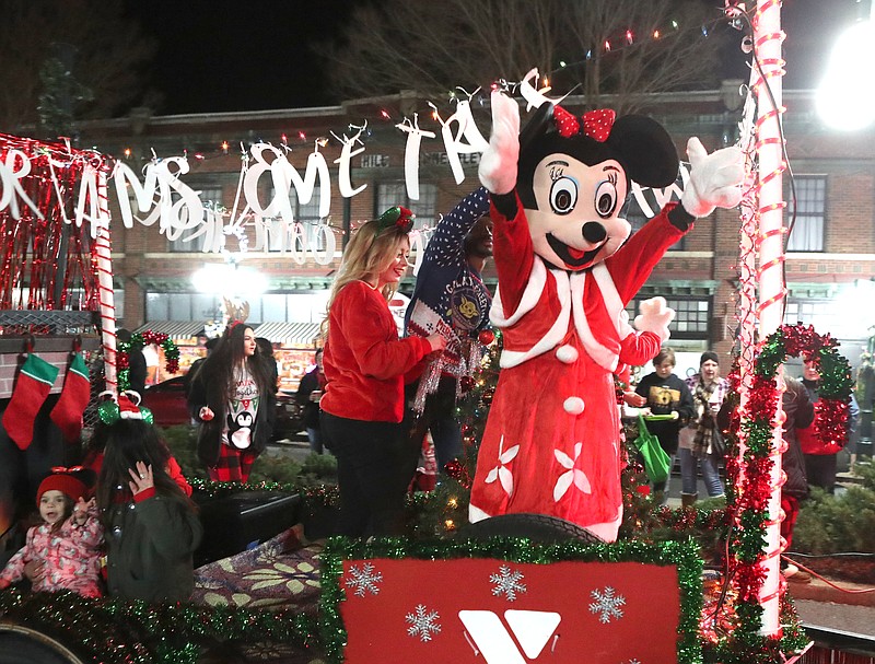 The Hot Springs Family YMCA’s float makes its way down Central Avenue during the 2021 Annual Christmas Parade hosted by Oaklawn Rotary on Monday. - Photo by Richard Rasmussen of The Sentinel-Record