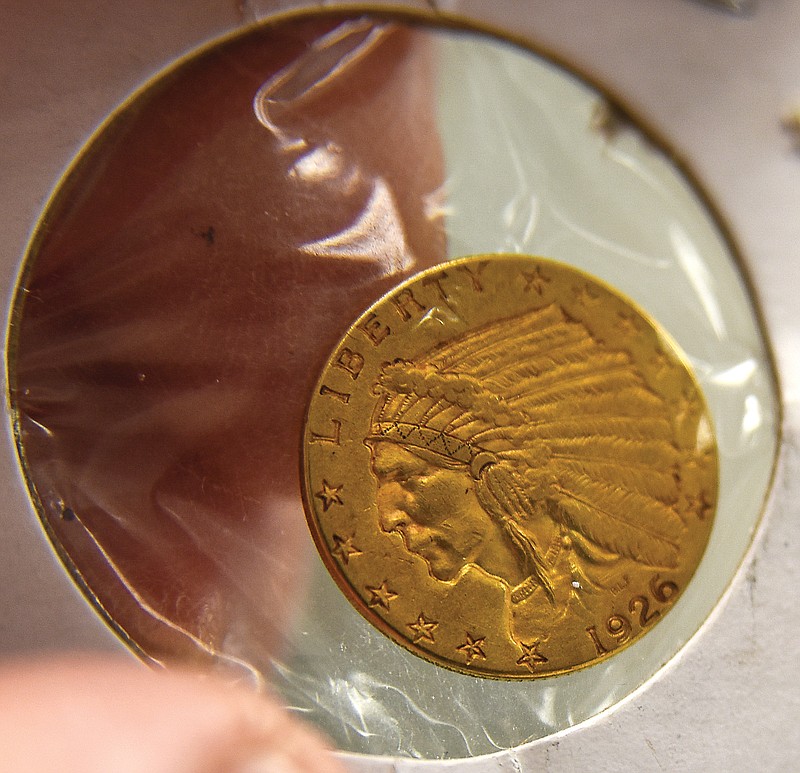 Julie Smith/News Tribune
A generous donor dropped a gold coin into a local Salvation Army kettle recently. The coin is a 1926 with an eagle on the reverse side and Indian head on the obverse.