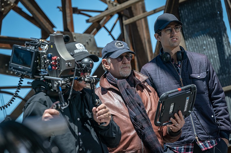 Director Steven Spielberg (center) and choreographer Justin Peck (right) watch the action on the set of “West Side Story.” (Courtesy of Walt Disney Studios)