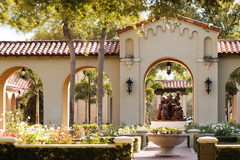 “A Beautiful Day for a Neighbor,” a bronze cast sculpture created by Paul Day, is the latest addition to the “Mister Rogers’ Neighborhood Walking Tour” at Rollins College. (Courtesy of Rollins College/Scott Cook)