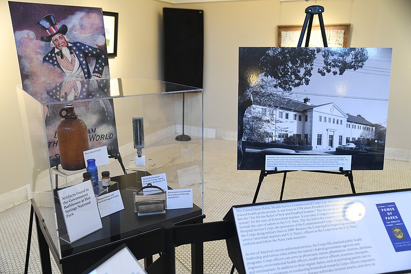 Artifacts from the Government Bath House at Hot Springs National Park are displayed in a temporary exhibit at the Ozark Bath House. - Photo by Tanner Newton of The Sentinel-Record