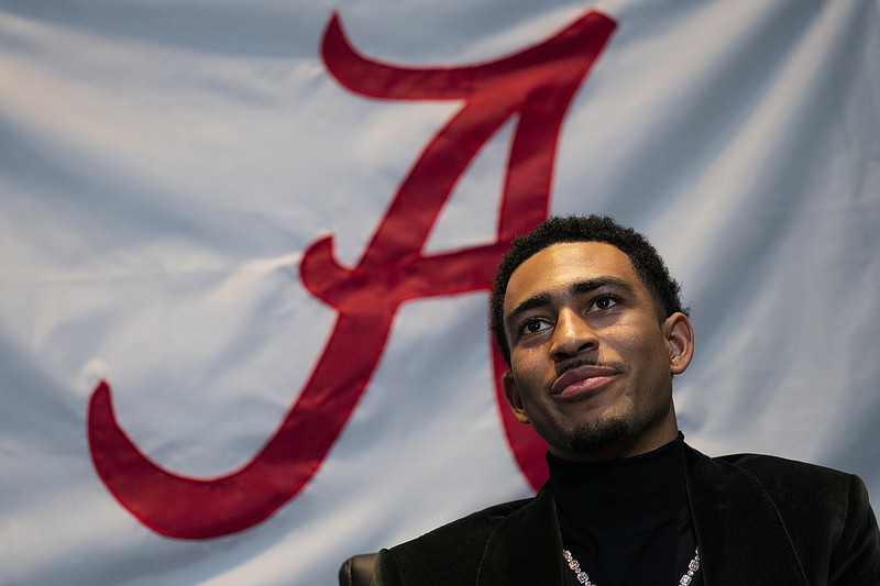 Heisman Trophy finalist Alabama quarterback Bryce Young speaks with members of the media before attending the Heisman Trophy award ceremony, Saturday, Dec. 11, 2021, in New York. (AP Photo/John Minchillo)