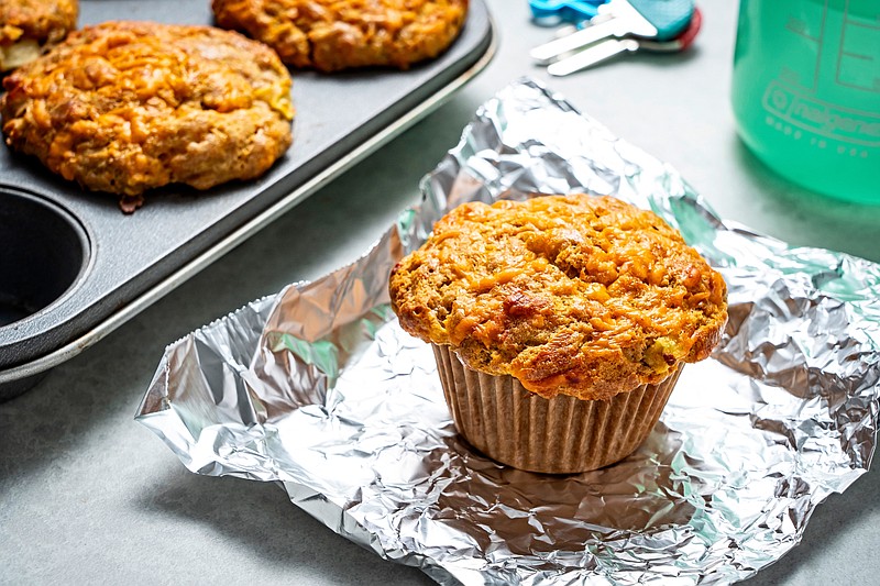 Apple Cheddar Muffins, dapted from &quot;Rise &amp; Run&quot; by Shalane Flanagan and Elyse Kopecky. MUST CREDIT: Photo for The Washington Post by Scott Suchman