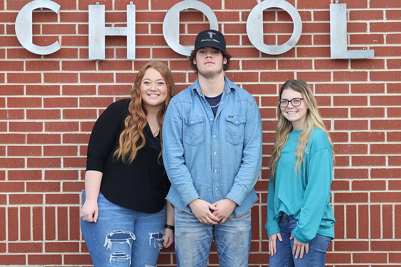 Photo by Michael Hanich
From left, Shelby Price, Hayden Bussell and Remi Harper saved a Camden woman Monday morning before her vehicle burst into flames.