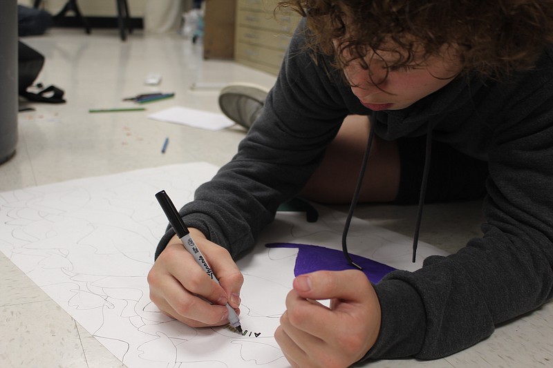 Greer Early works on an art project at Redwater High School. (Photo courtesy of Nick Pappas)