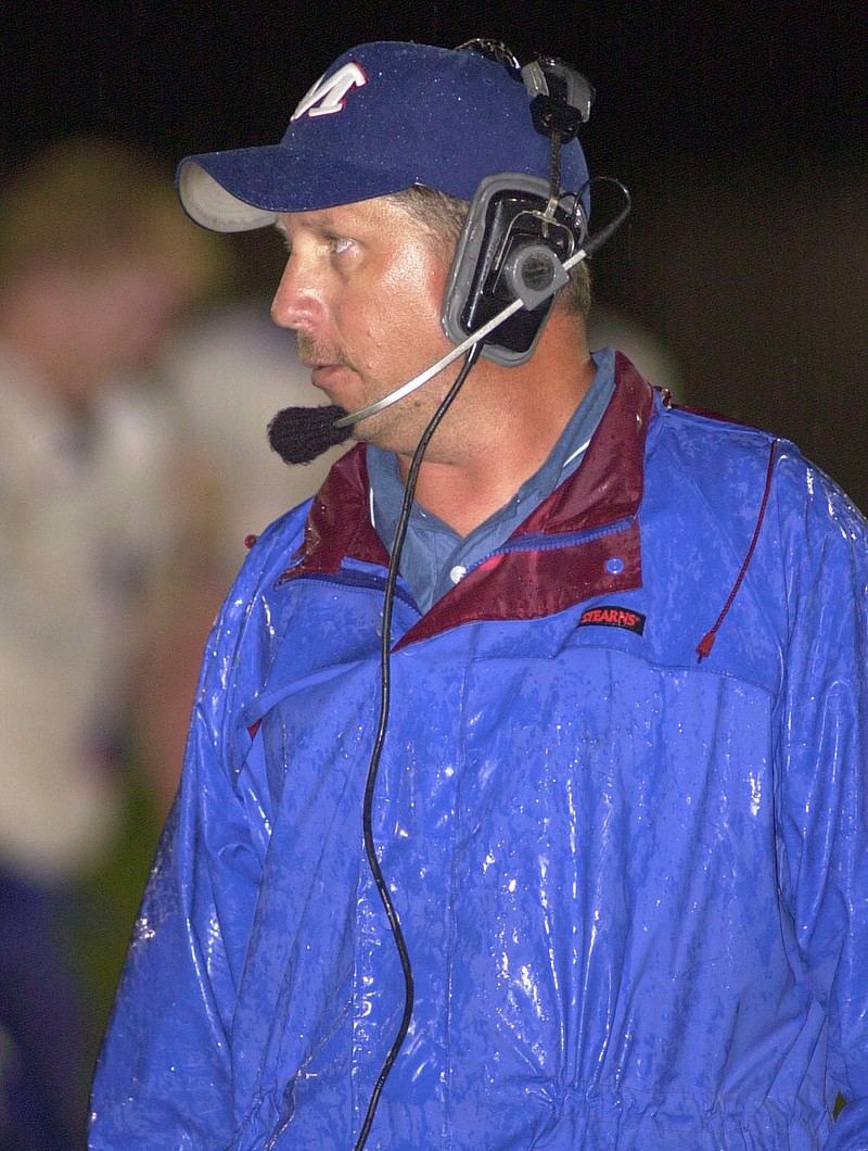 Arkansas Democrat-Gazette/ MICHAEL WOODS

Mountainburg head coach Tom Harrell watches his team during Friday nights game in Elkins in 2003.