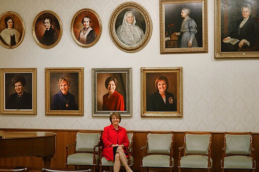 Sharon Eubank, first counselor in the general presidency of the Relief Society, which is made up of all adult women in The Church of Jesus Christ of Latter-day Saints, poses for a photograph Tuesday, Dec. 7, 2021, in Salt Lake City. Though she isn&#x2019;t the first single or child-free woman to hold a prominent role in the church, Eubank&#x2019;s example is encouraging to other members during a time of growth for women&#x2019;s roles in the faith nearly a decade after a key change for young women in its iconic missionary force. Still, some want to see a faster pace for progress. (AP Photo/Rick Bowmer)