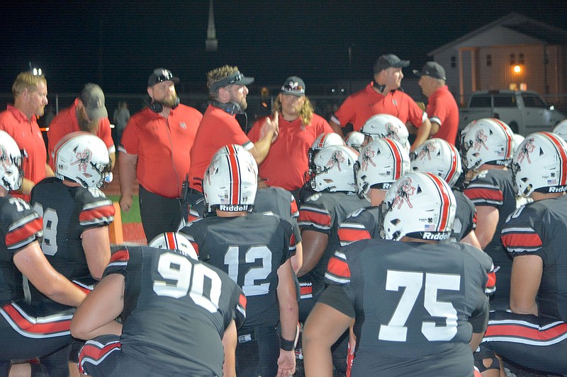 Al Gaspeny/File Photo
Coach Kellen Hoover talks to the McDonald County football team after a game this season.