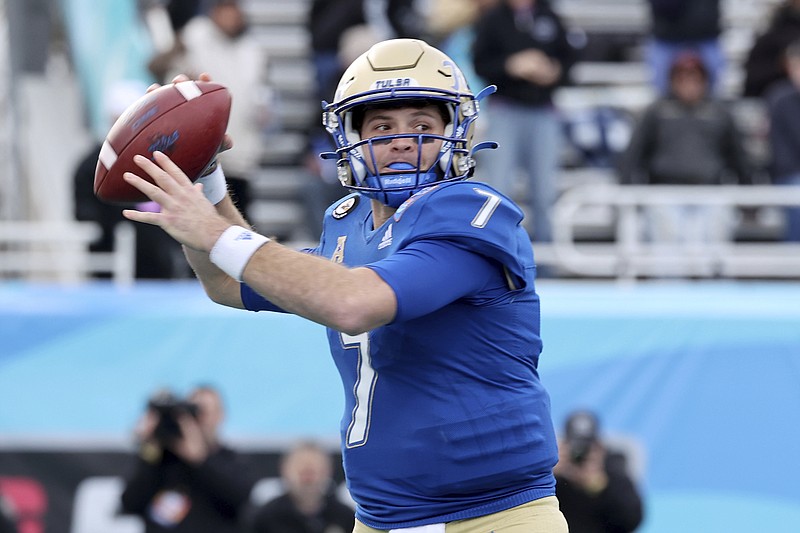 Tulsa's Davis Brin (7) throws the ball over the Old Dominion defense in the first half of an NCAA college football game in the Myrtle Beach Bowl in Conway, S.C., Monday, Dec. 20, 2021. (AP Photo/Mic Smith)