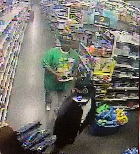 Two men suspected in a Dollar General store robbery are shown in a security photo. (Special to The Commercial)