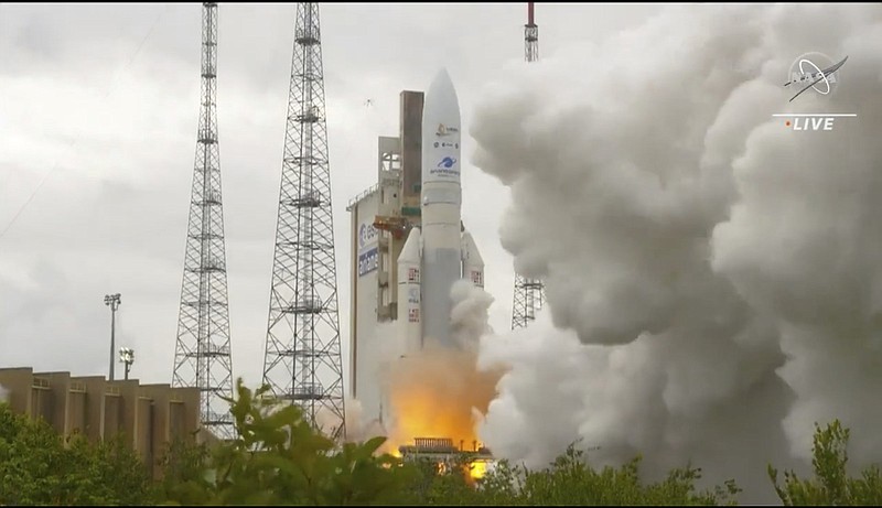 In this image released by NASA, Arianespace's Ariane 5 rocket with NASA's James Webb Space Telescope onboard, lifts off  Saturday, Dec. 25, 2021, at Europe's Spaceport, the Guiana Space Center in Kourou, French Guiana.  The $10 billion infrared observatory is intended as the successor to the aging Hubble Space Telescope.  (NASA via AP)