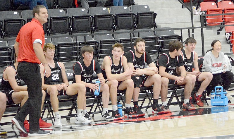 Al Gaspeny/Special to McDonald County Press
McDonald County coach Brandon Joines and his players watch during the final moments of a 66-46 victory over Pea Ridge in the third-place game at the Battle at the Ridge tournament on Dec. 11 in Pea Ridge, Ark.