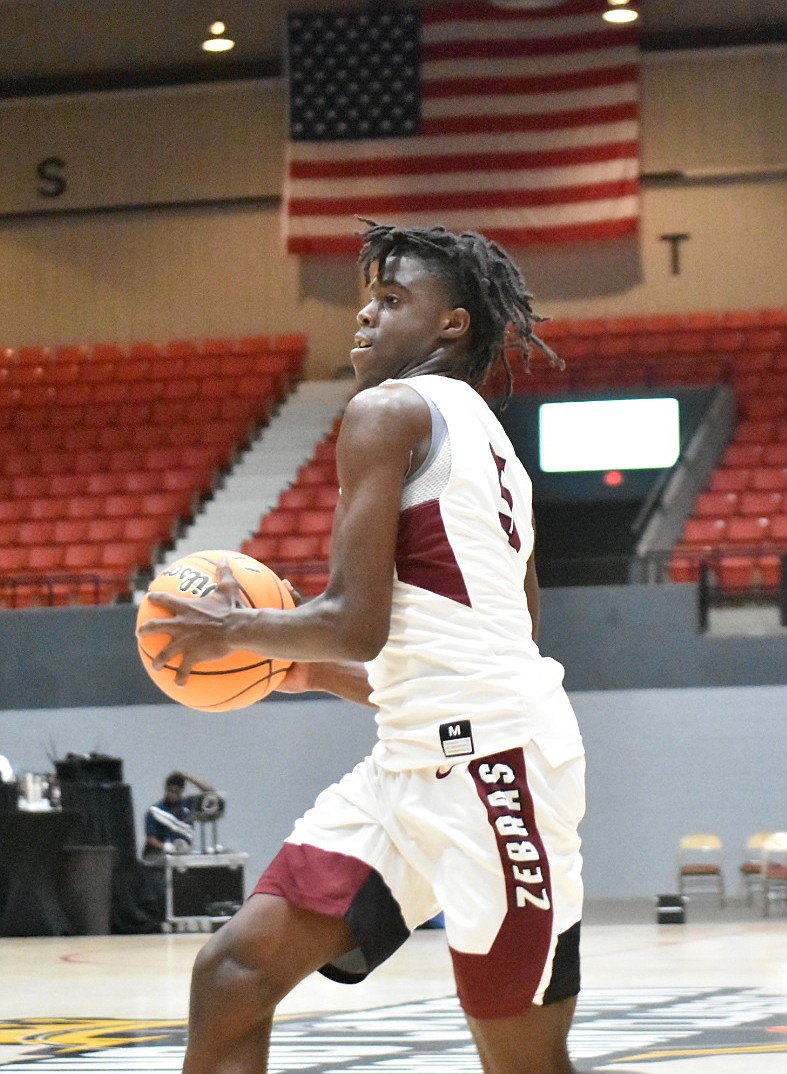 Courtney Crutchfield of Pine Bluff goes up for a basket against Calvary Baptist Academy in the second quarter Tuesday, Dec. 28, 2021, at the Pine Bluff Convention Center. (Pine Bluff Commercial/I.C. Murrell)