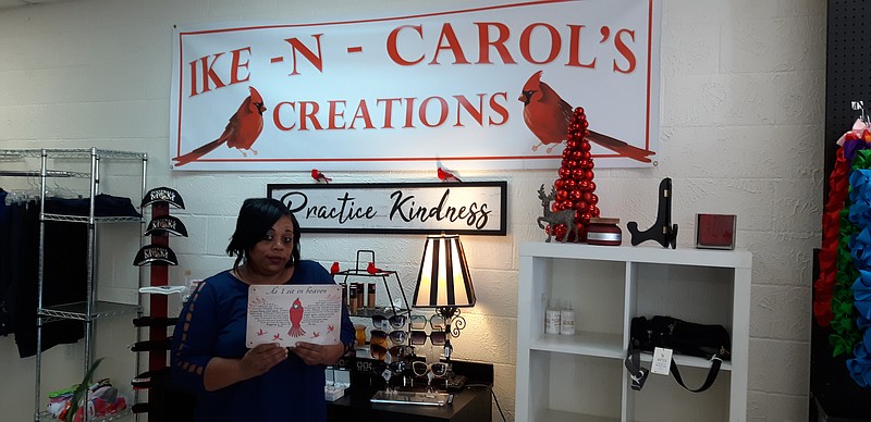 Shuntrell Rogers established Ike-N-Carol's Creations in honor of both her mother and father. Wanting to begin her own enterprise and feeling inspired by prayer, her store, established in November, features a range of clothing for both men and women. (Staff photo by Junius Stone)