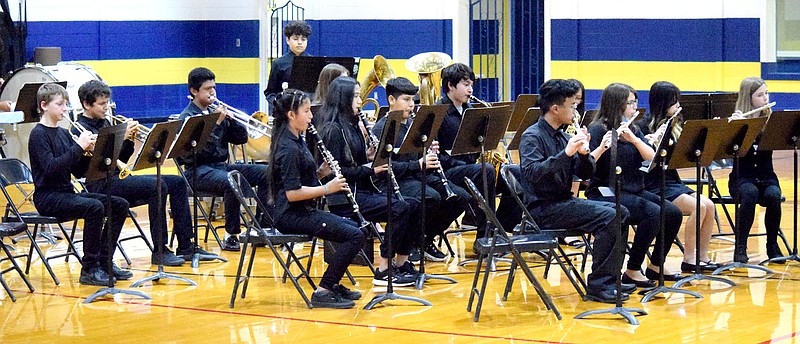 Westside Eagle Observer/MIKE ECKELS
The Decatur Middle School Band performs "In the Bleak Midwinter" by Gustav Holst, arranged by Jack Bullock, during the DMS/DHS Band Christmas concert at Peterson Gym in Decatur Thursday night.