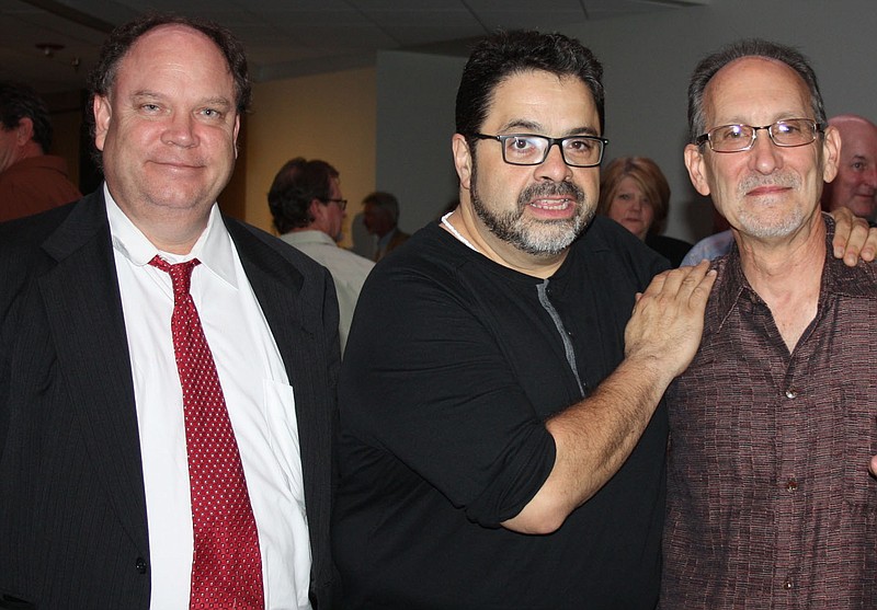 NWA Democrat-Gazette/CARIN SCHOPPMEYER Robert Ginsburg (from right), stands with Jazz Heritage Society members at a reception in honor of his being presented the Jazz Hero Award April 29 at the Walton Arts Center in Fayetteville.