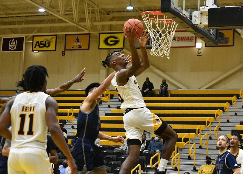 A.J. Stredic of UAPB scores a basket as he is fouled against Ecclesia College on Dec. 18 in Pine Bluff. (Pine Bluff Commercial/I.C. Murrell)